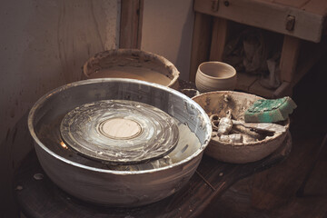 An empty circle, where the potter molds product.