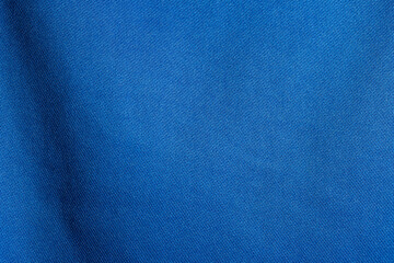 Navy blue fabric cloth polyester texture background.