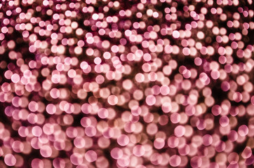 Pink bokeh, abstract background with defocused sparkling light