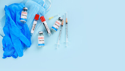 Covid-19 Corona Virus 2019-ncov vaccine vials medicine drug bottles syringe injection. Vaccination, immunization, treatment to cure Covid 19 Corona Virus infection.