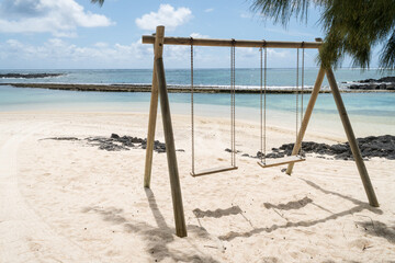 swing on the beach on a tropical island concept sun, sea, sand in Mauritius