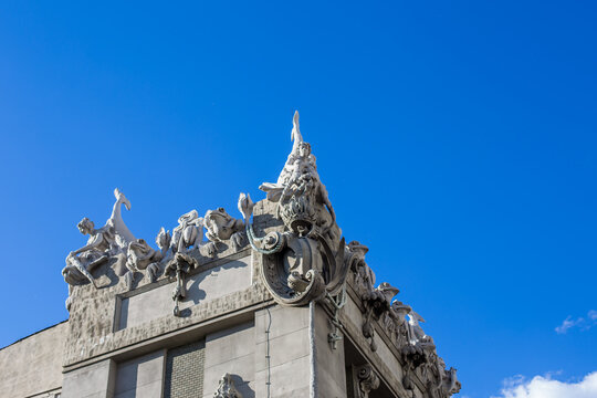 
General plan of a house with chimeras in the center of Kiev against a blue sky with a place for text.