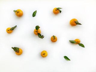 tangerines isolated on light space