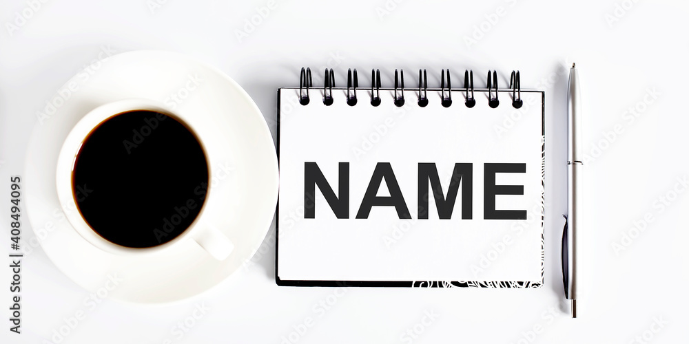 Poster business name . spiral notebook with text on the white background with coffee