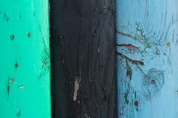 three multicolored blue black turquoise old woods with scratches and nails