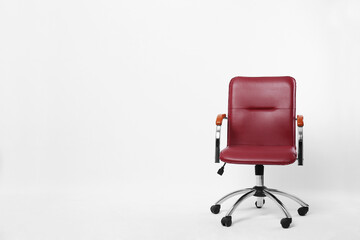 Comfortable office chair on white background, space for text