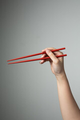 hand chopstick red color asian japanese chinese food style traditional
