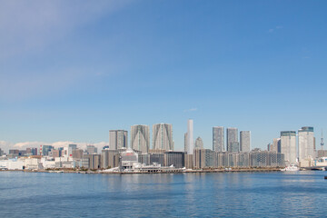 Panoramic Tokyo cityscape facing the bay of water