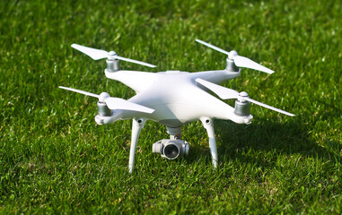 White kvadrocopter ready to fly. A beautiful drone for photos and videos and clearance for his...