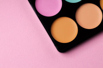 Cosmetics for face complexion on pink background