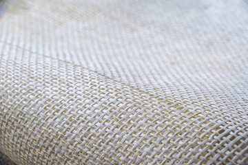 Sackcloth texture or background fading into blurred edges. 