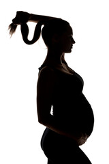 silhouette of a young pregnant woman