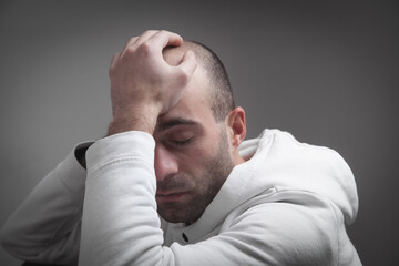 Fototapeta premium Caucasian sad and depressed man at home.