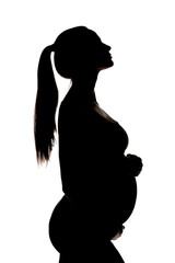 silhouette of a young pregnant woman