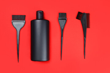 Set for hair coloring on a red background