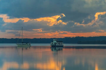 Night Sky with Storm Clouds Rolling In and Boats on the Water