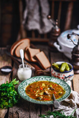 rassolnik ,traditional russian soup with pickles.style rustic