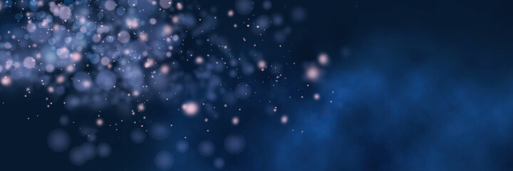 Obraz na płótnie Canvas Blurred bokeh light on dark blue background. Christmas and New Year holidays template. Abstract panoramic background.