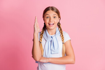 Photo of young schoolgirl happy smile raise hand answer question lesson tight jumper isolated over pink color background