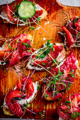 Beetroot and dill salmon gravlax.style rustic