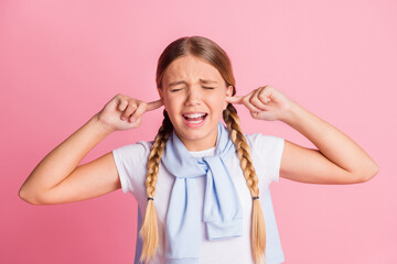 Portrait of sad girl close ears cry wear white t-shirt isolated on pink color background