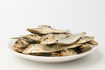 Dried herring on white background
