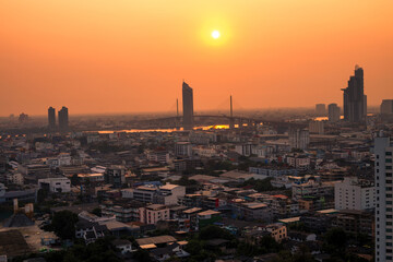 panoramic high-angle evening background of the city view,with natural beauty and blurred sunsets in the evening and the wind blowing all the time,showing the distribution of city center accommodation