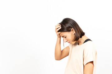 Side view of a worried latin young woman with depression. Mental health and psychology concept.