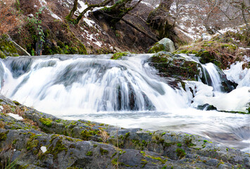 Obraz premium River waterfall and frozen water
