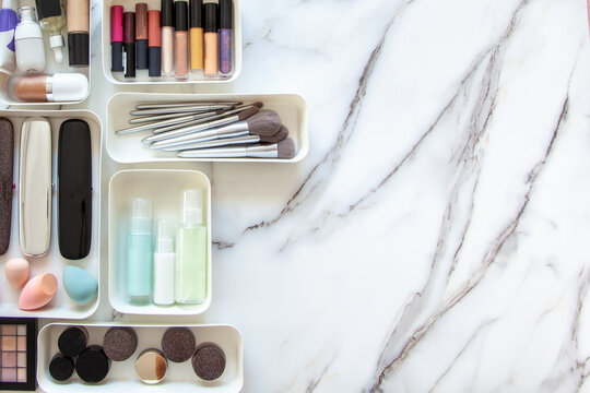 Neatly Placing Cosmetic And Vanity Items In MUJI's PP Makeup Storage Boxes.