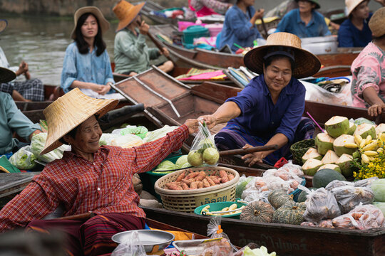 Local Market People In Asia .Asian Tourists Local Markets. Floating Market It Is Famous In Thailand Called Tha Kha Floating Market In Samut Sakhon Province	