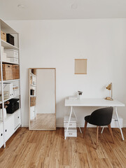 Modern nordic interior design concept. Scandinavian home office, minimal workspace. Business study cabinet. Girl boss studio concept.