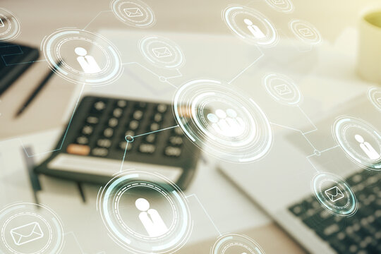 Abstract virtual social network concept on calculator and laptop background. Multiexposure