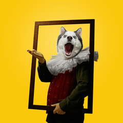Framing. Model like medieval royalty person in vintage clothing headed by dog head on bright yellow...