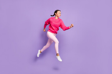 Fototapeta na wymiar Full length profile side photo of excited happy woman run jump sale empty space isolated on violet color background