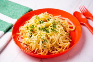 Espaguetis aglio olio traditional recipe from Italy.