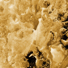 Gold ink and watercolor texture on white paper background. Paint leaks and decalcomania effects. Hand-painted gouache abstract image. Mess on the canvas.