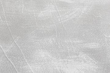 Abstract light gray natural empty decorative plaster background with rough textured shabby surface