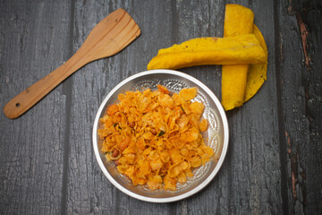 Boli with Corn Flakes in a steel plate