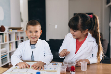 children do chemical experiments from kitchen ingredients at home