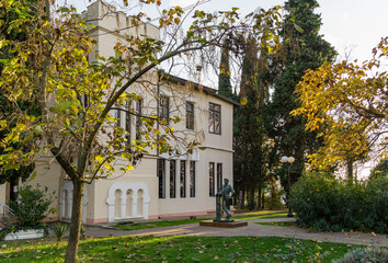 Beautiful historical old building of Pushkin Library with monument to famous russian poet Alexander...