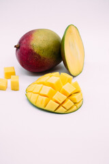 Ripe mango on a white background.