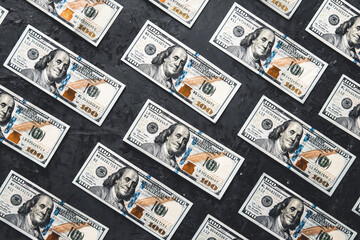 Fototapeta na wymiar One hundred dollar bills are creatively laid out. Business concept, development perspective.