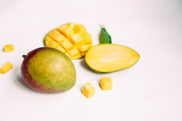 Ripe mango on a white background.