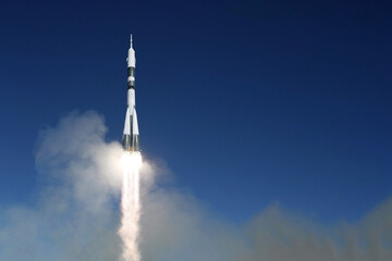 Launch of a space rocket into space. Against the background of the sky. Elements of this image were...