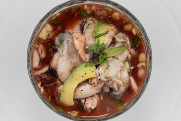 Overhead view of cup of aphrodisiac ingredients of shellfish including oysters for a delicious...