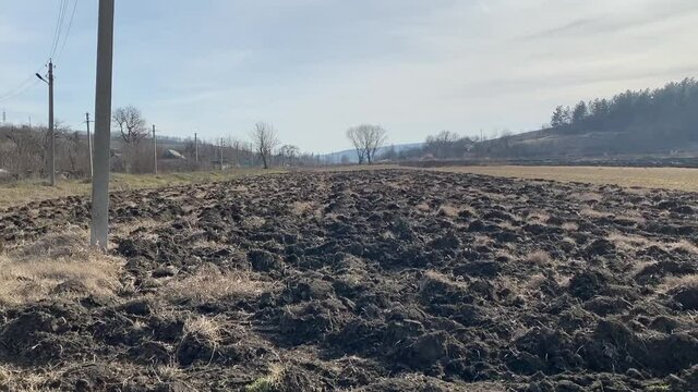 Panoramic view of the tilled field in the countryside in winter