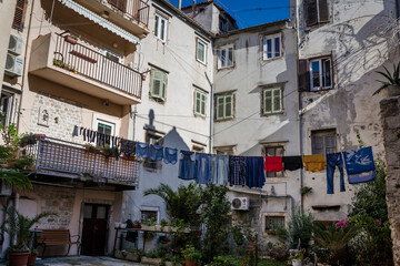 Laundry drying on washing line in a courtyard in the Old Town, Zadar, Dalmatia, Croatia