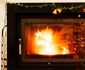 view of a fireplace with a burning fire