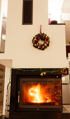 view of a fireplace with a burning fire